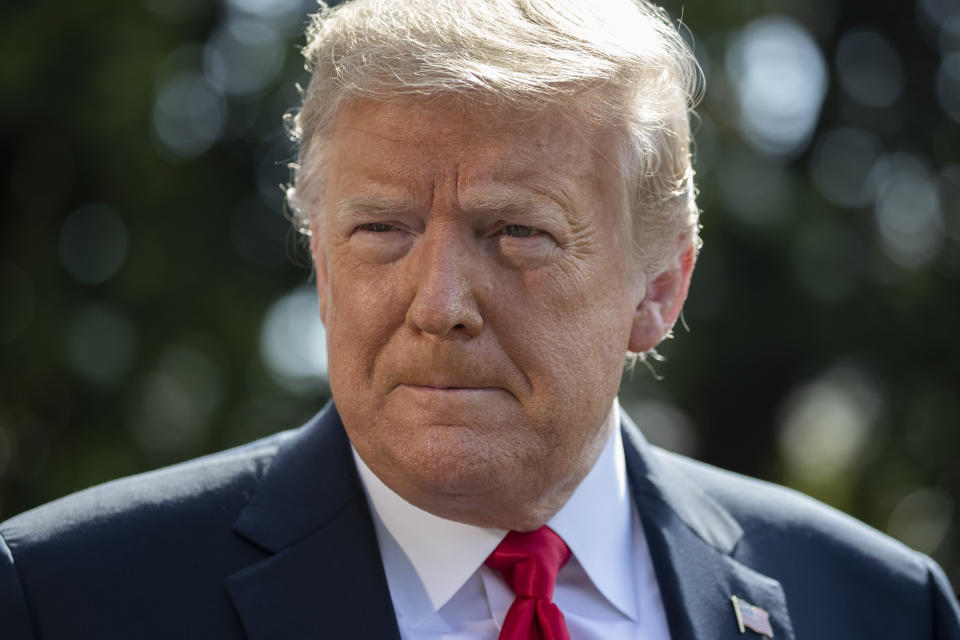 President Donald Trump speaks with reporters before departing on Marine One on the South Lawn of the White House, Tuesday, June 23, 2020, in Washington. (AP Photo/Alex Brandon)