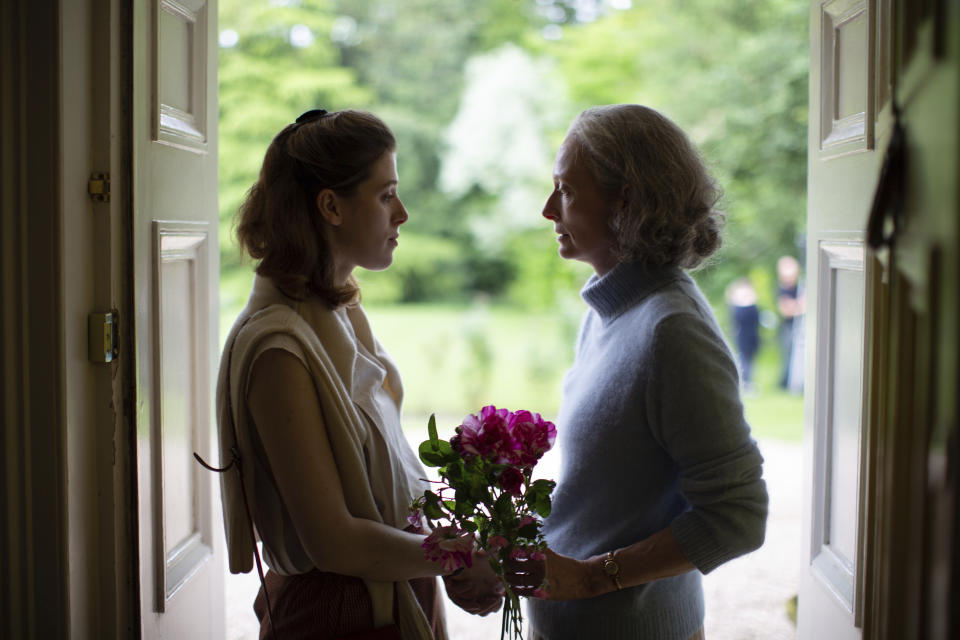 This image release A24 shows Honor Swinton Byrne, left, and Tilda Swinton in a scene from "The Souvenir Part II." (A24 via AP)