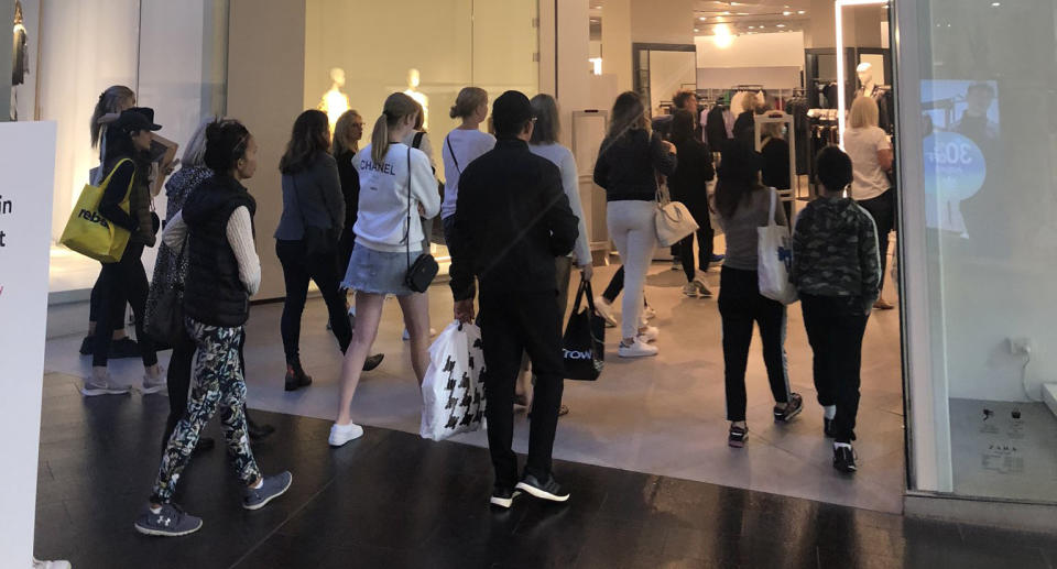 Shoppers crowd Westfield at Bondi Junction despite COVID-19 restrictions.