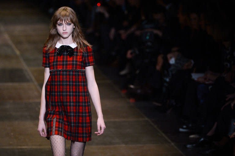 A model presents a creation for Saint Laurent during the Fall/Winter 2013-2014 ready-to-wear collection show on March 4, 2013 in Paris