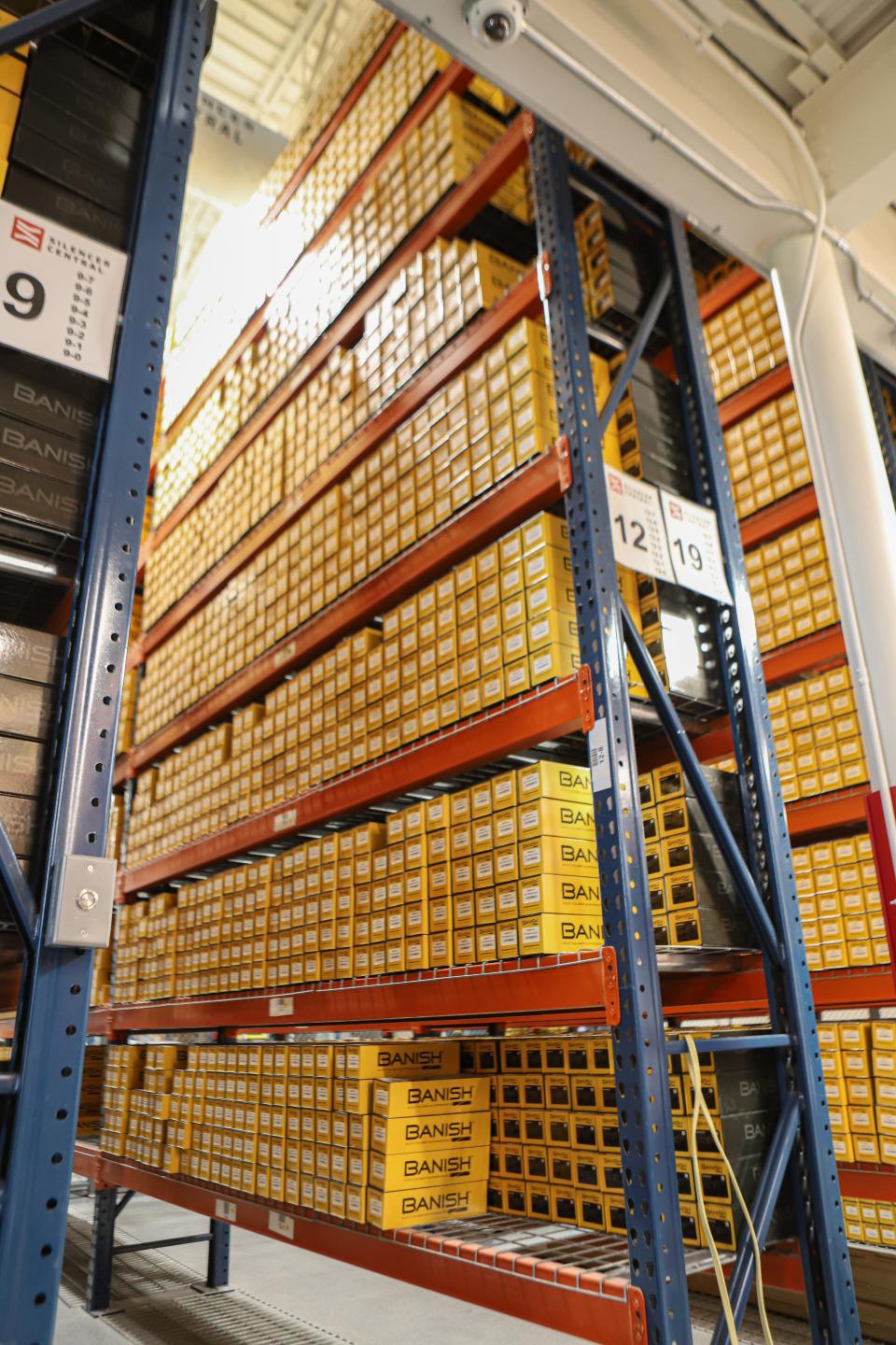 Silencer inventory stretches two stories high in the warehouse portion of their new headquarters in nothern Sioux Falls Tuesday, June 28.