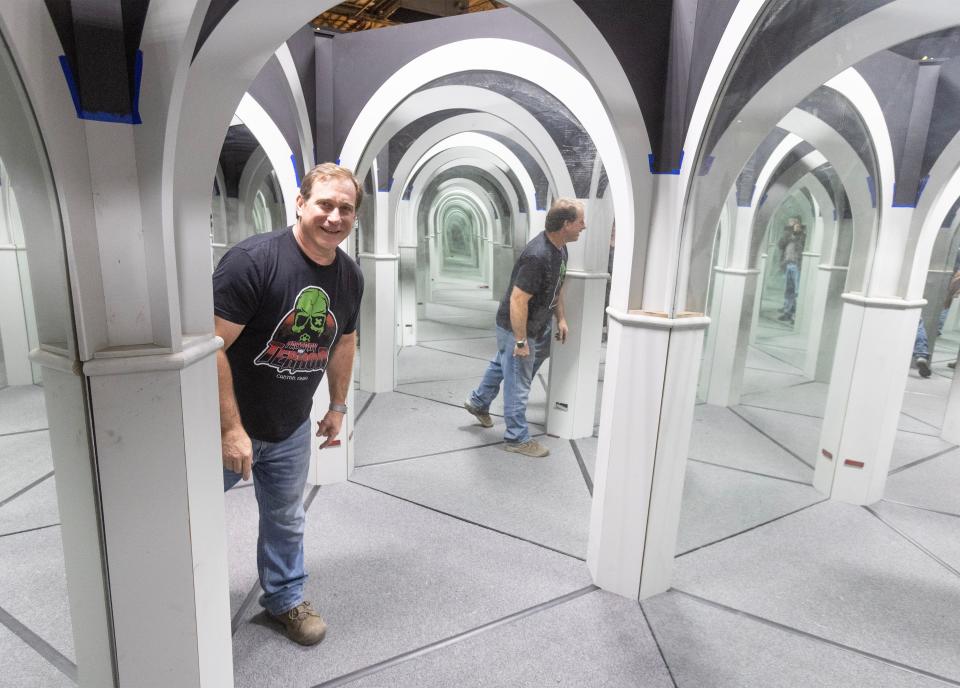 John Eslich, owner of the Factory of Terror in Canton, shows off the re-invented mirror maze. The Halloween attraction opens for the season on Saturday.