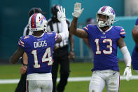 Buffalo Bills wide receiver Stefon Diggs (14) congratulates wide receiver Gabriel Davis (13) after Davis scored a touchdown, during the second half of an NFL football game against the Miami Dolphins, Sunday, Sept. 20, 2020, in Miami Gardens, Fla. The Bills defeated the Dolphins 31-28. (AP Photo/Lynne Sladky)