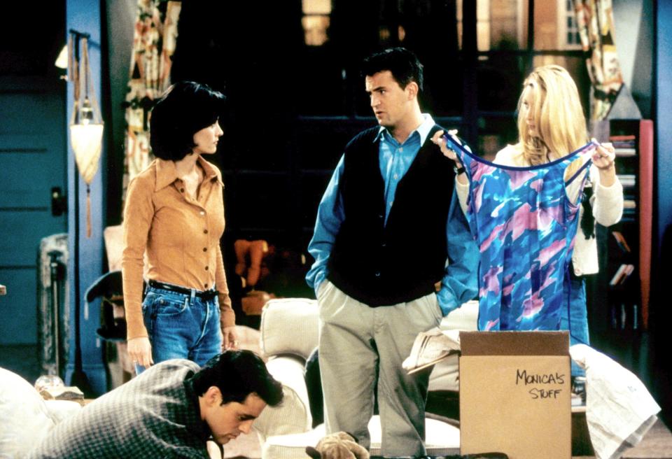 the Friends unpack boxes of Monica's belongings