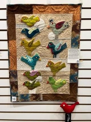 A quilt by a member of the Oak Island Beach Quilters. The overall theme is birds.