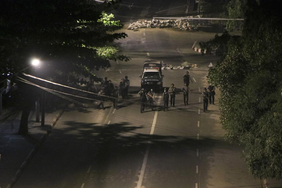 Armed police patrol a street in downtown Yangon, Myanmar, Sunday, March 21, 2021. Protests against the coup continued in cities and town across the country, including in Mandalay and Yangon. (AP Photo)
