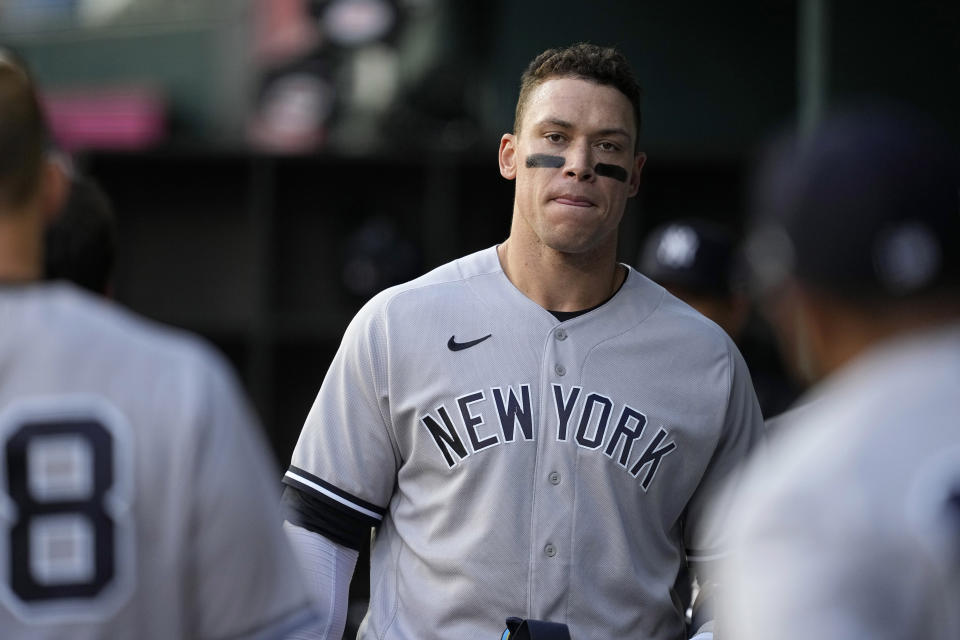 New York Yankees' Aaron Judge walks through the dugout during the first inning of the team's baseball game against the Texas Rangers, Thursday, April 27, 2023, in Arlington, Texas. (AP Photo/Tony Gutierrez)