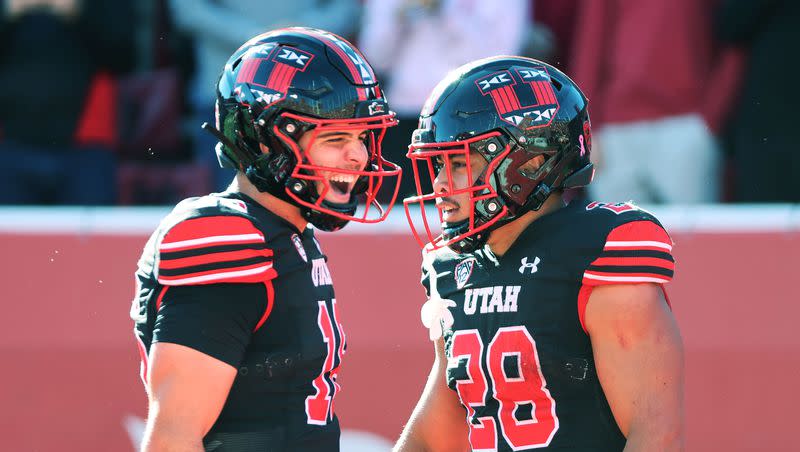 Utah Utes safety Sione Vaki (28) celebrates his touchdown with Utah Utes quarterback Bryson Barnes (16) against the California Golden Bears in Salt Lake City on Saturday, Oct. 14, 2023. Utah won 34-14.