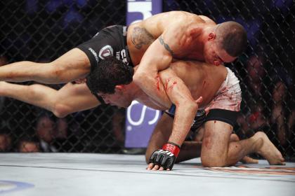 Diego Sanchez (top) has the advantage over Gilbert Melendez in UFC 166. (USA TODAY Sports)