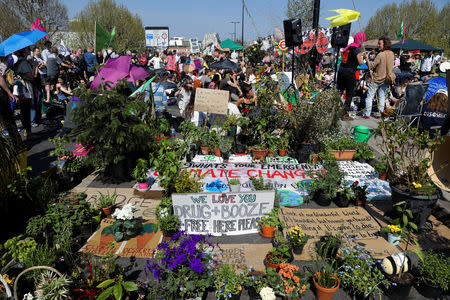 Climate change activists attend the Extinction Rebellion protest on Waterloo Bridge in London, Britain April 20, 2019. REUTERS/Simon Dawson