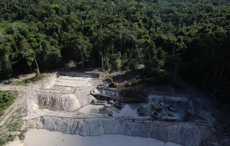 An aerial view of a wildcat gold mine on a deforested plot of Amazon rainforest near the city of Castelo dos Sonhos, Para state, June 22, 2013. REUTERS/Nacho Doce