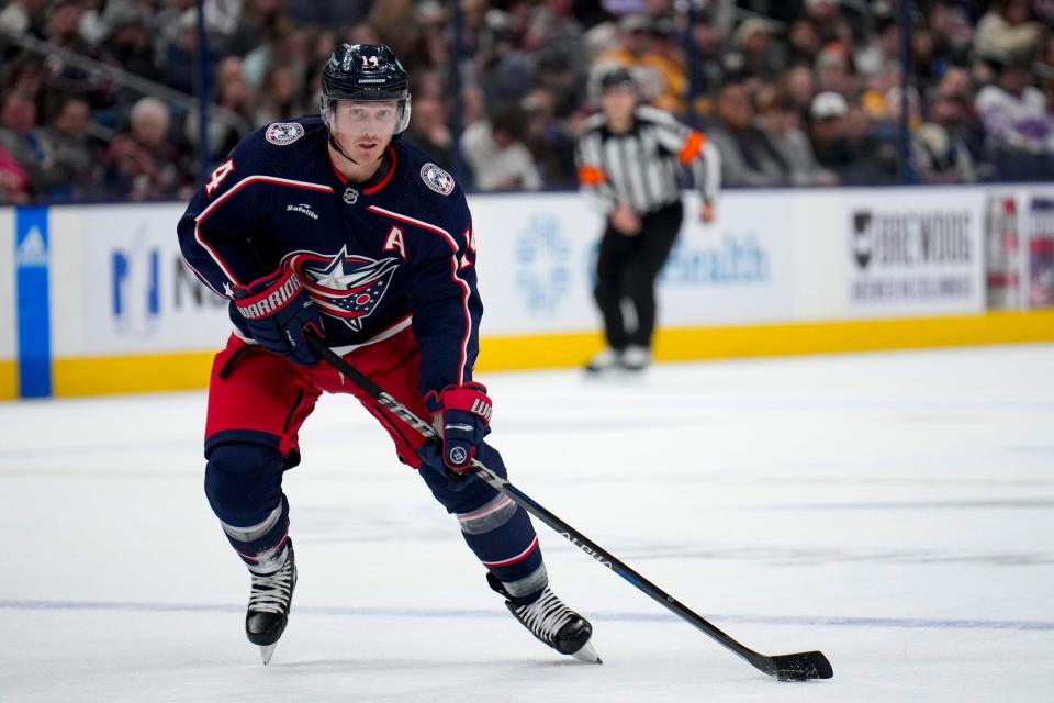 Blue Jackets forward Gustav Nyquist skates down the ice in a game against the Predators.