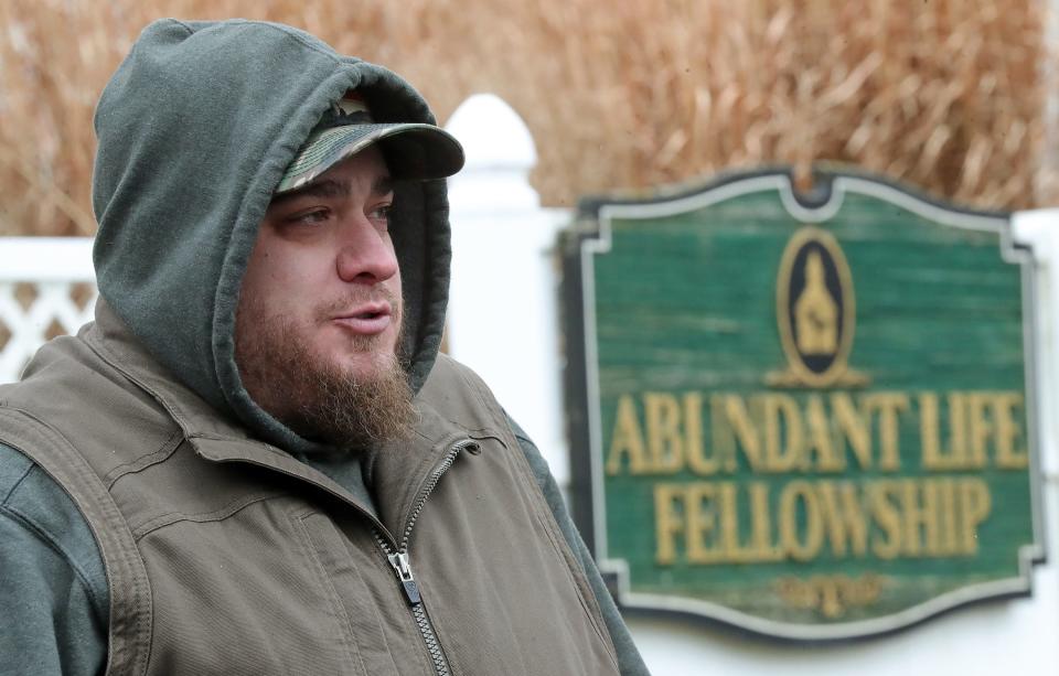 Shawn Bruce of East Palestine speaks about the Feb. 3 Norfolk Southern train derailment outside the company's Family Assistance Center in New Waterford, Ohio, on Friday.