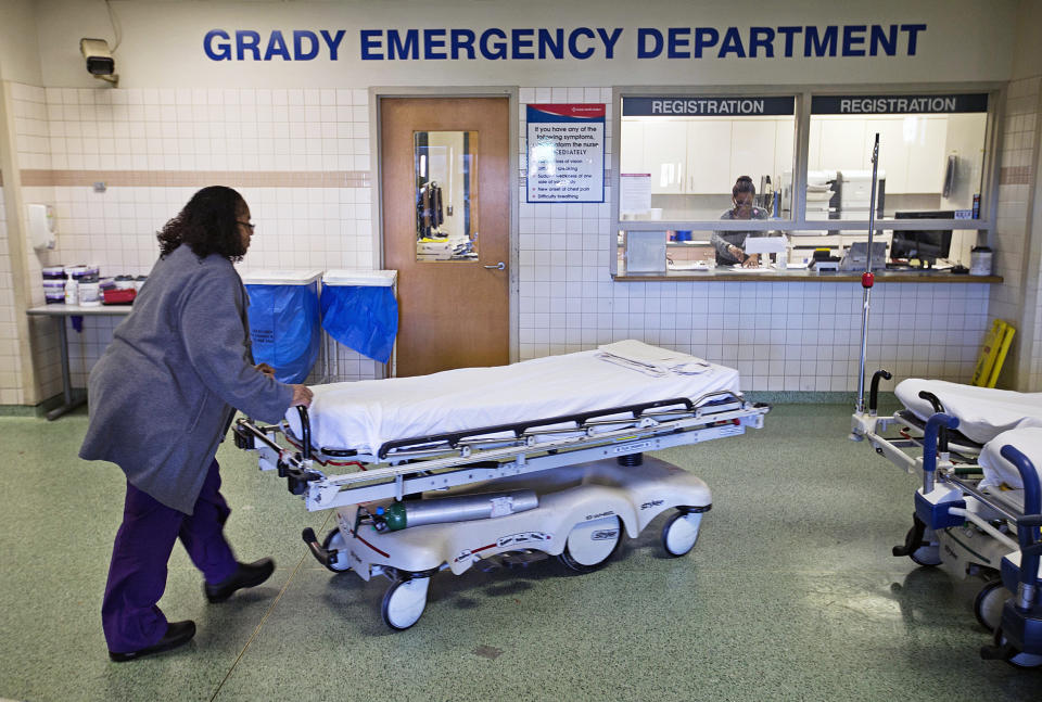 A worker wheels beds through the emergency department at Grady Memorial Hospital, in Atlanta on  Jan. 24, 2014. (David Goldman / AP file)