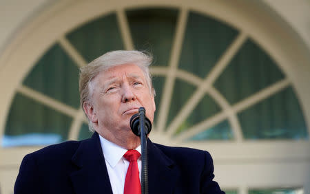 U.S. President Donald Trump pauses as he announces a deal to end the partial government shutdown as while speaking in the Rose Garden of the White House in Washington, U.S., January 25, 2019. REUTERS/Kevin Lamarque