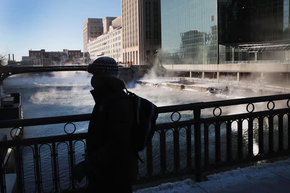 The Chicago River is partially frozen.