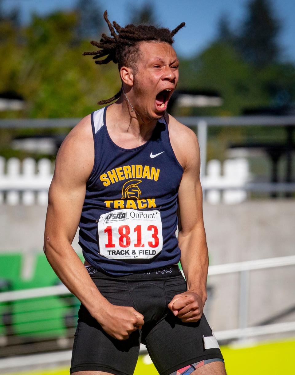 Sheridan’s Randy Gibson celebrates his winning jump in the 2A boys high jump Friday, May 20, 2022, at the OSAA State Track & Field Championships at Hayward Field in Eugene.