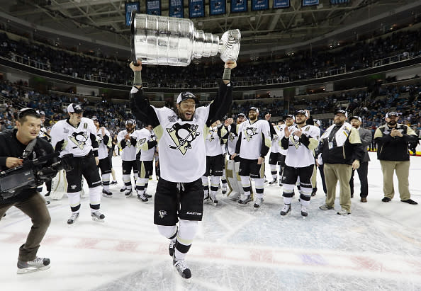 SAN JOSE, CA - JUNE 12: Matt Cullen #7 of the Pittsburgh Penguins celebrates with the Stanley Cup after their 3-1 victory to win the Stanley Cup against the San Jose Sharks in Game Six of the 2016 NHL Stanley Cup Final at SAP Center on June 12, 2016 in San Jose, California. (Photo by Bruce Bennett/Getty Images)