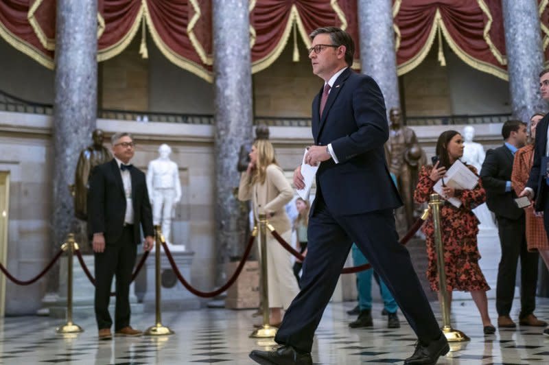 Speaker of the House Mike Johnson, R-La., walks to a press conference after the Senate concluded impeachment proceedings against Secretary of Homeland Security Alejandro Mayorkas at the U.S. Capitol in Washington, D.C., on Wednesday. Johnson also announced plans, despite internal opposition, to advance an aid package for Ukraine, Israel and Taiwan later this week. Photo by Bonnie Cash/UPI.