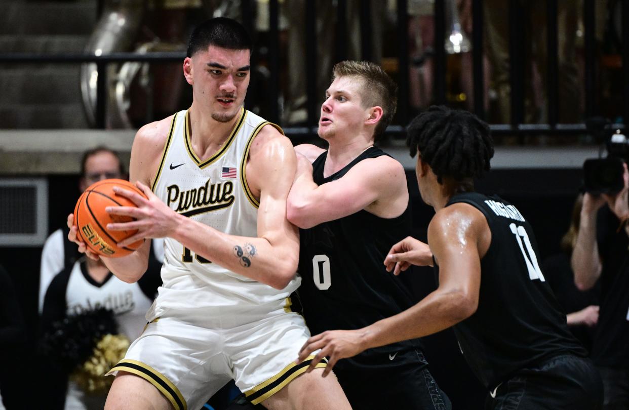 Purdue center Zach Edey pushes against Michigan State forward Jaxon Kohler during the first half on Saturday, March 2, 2024, in West Lafayette, Indiana.