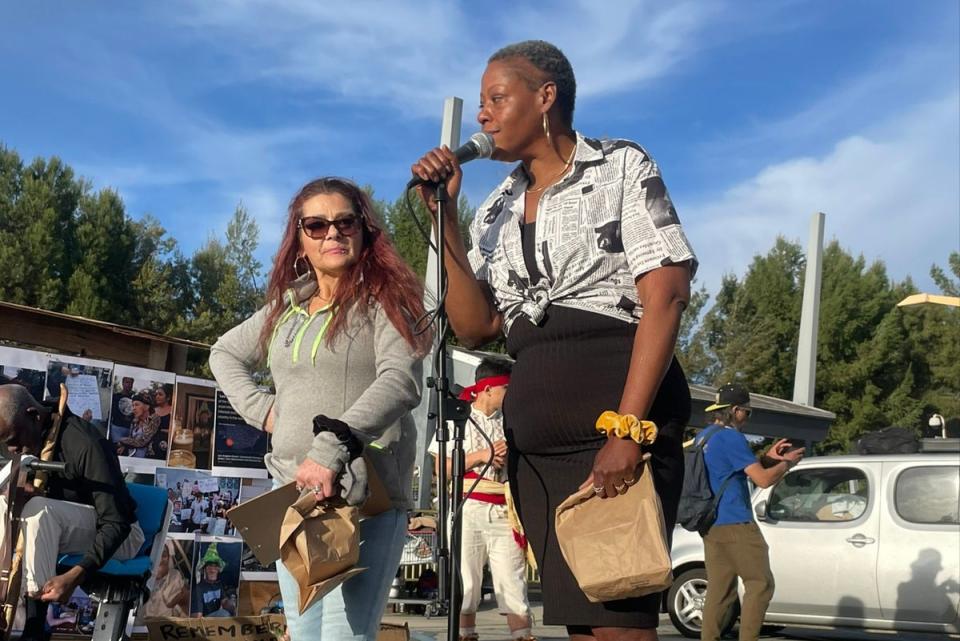 Van Nuys homeless community members Kookie (left) and Jelly (right) speak at a memorial event for their frriends (Anthony Orendorff)