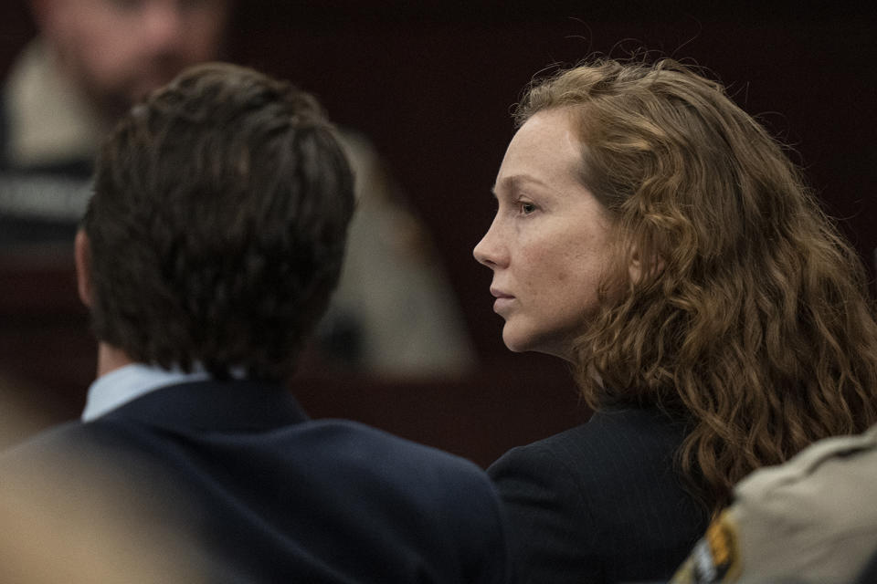 Kaitlin Armstrong sits with her defense lawyers during her murder trial at the Blackwell-Thurman Criminal Justice Center on Thursday, Nov. 16, 2023, in Austin, Texas. Armstrong is charged with killing of Anna Moriah Wilson in May 2022 (Mikala Compton/Austin American-Statesman via AP, Pool)