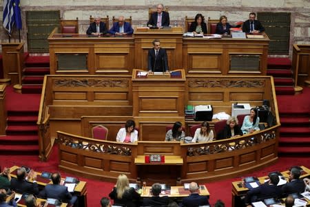 Greek PM Mitsotakis presents his government's main policies during a parliamentary session in Athens