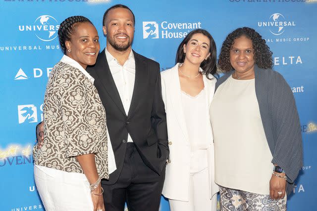 <p>Ron Adar/Shutterstock</p> Sandra Brunson alongside Jalen Brunson and his wife Alison Marks at A Night of Covenant House Stars Gala in May 2023.