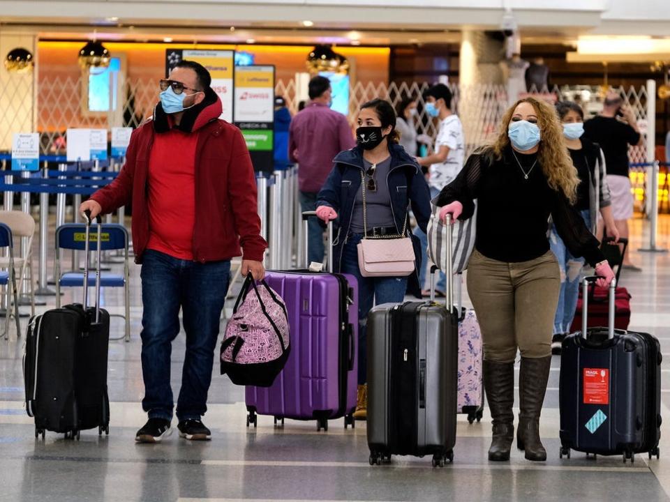 Travelers at LAX airport in December 2020