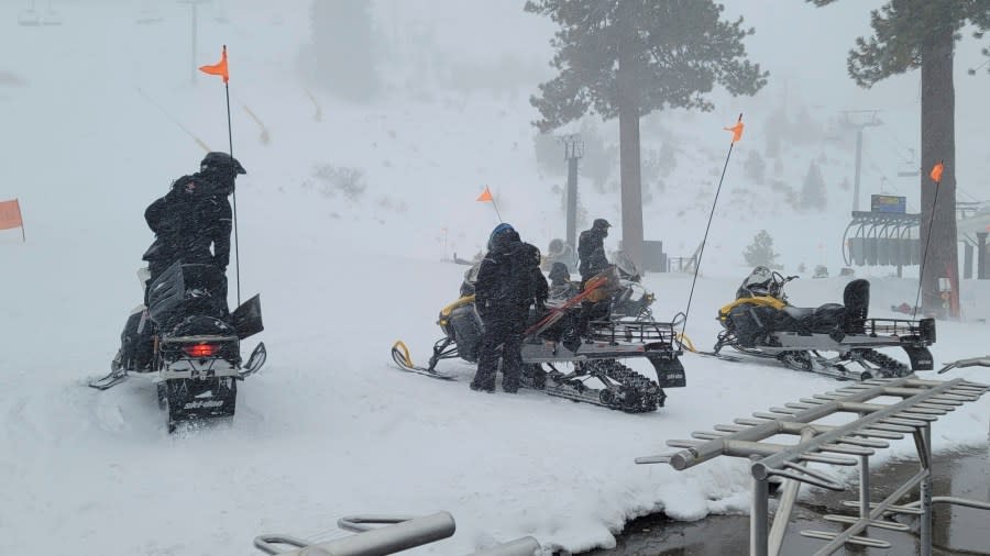 Rescue crews work at the scene of an avalanche at the Palisades Tahoe ski resort on Wednesday, Jan. 10, 2024, near Lake Tahoe, Calif. The avalanche roared through a section of expert trails at the ski resort as a major storm with snow and gusty winds moved into the region, authorities said. (Mark Sponsler via AP)