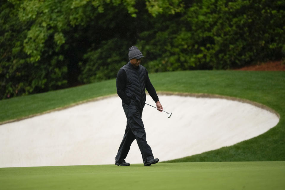 Tiger Woods walks on the 13th hole during the weather delayed third round of the Masters golf tournament at Augusta National Golf Club on Saturday, April 8, 2023, in Augusta, Ga. (AP Photo/Matt Slocum)