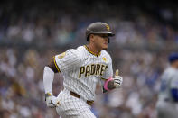 San Diego Padres' Manny Machado runs as he grounds out during the first inning of a baseball game against the Los Angeles Dodgers, Saturday, May 11, 2024, in San Diego. (AP Photo/Gregory Bull)