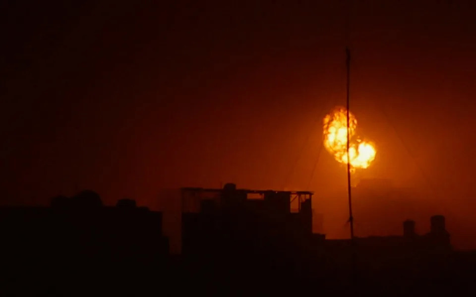 An explosion takes place during Israeli air strikes in Khan Younis in the southern Gaza Strip