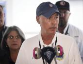 Surfside Mayor Charles Burkett gives remarks during the daily morning news conference outside the County's operational center on Sunday, July 11, 2021 in Surfside, Fla. Miami-Dade and Surfside mayors updated the media on the overnight and daily operational details after the partial collapse of the Champlain Towers South. (Carl Juste/Miami Herald via AP)