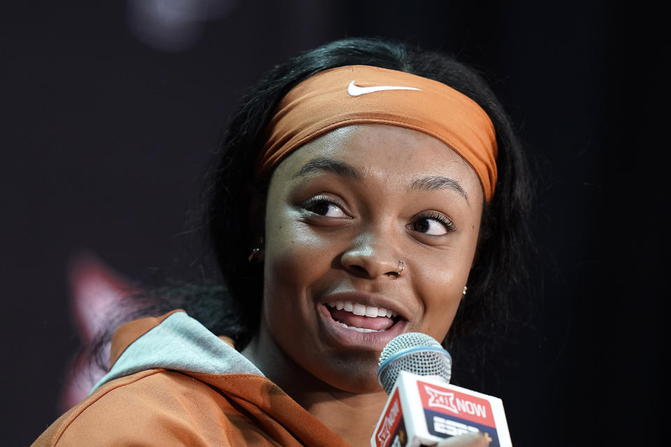 Texas forward Aaliyah Moore speaks to the media during Big 12 NCAA college basketball media day Tuesday, Oct. 18, 2022, in Kansas City, Mo. (AP Photo/Charlie Riedel)