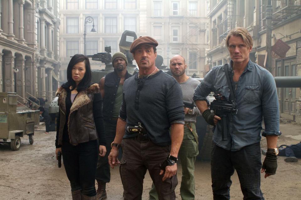 This film image released by Lionsgate shows, from left, Yu Nan, Terry Crews, Sylvester Stallone, Randy Couture and Dolph Lundgren in a scene from "The Expendables 2." (AP Photo/Lionsgate-Millennium Films, Frank Masi)