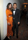 <p>Chrissy Teigen donned a burnt-orange gown from designer Paule Ka at a 2017 Grammy Awards afterparty on February 12, 2017 in Los Angeles. (Photo: Getty Images)<br><br></p>