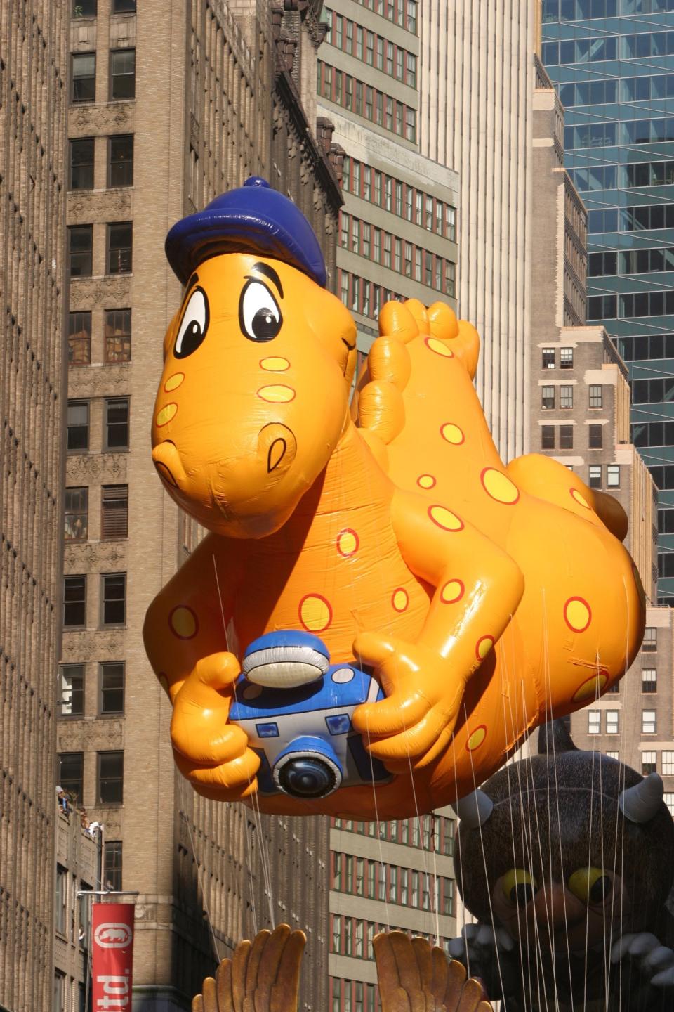 This dino is solely responsible for kids of the 2000s asking their parents for a <a href="http://www.youtube.com/watch?v=SmGl2Qx1uDQ" target="_blank">cheese slip n' slide</a>.