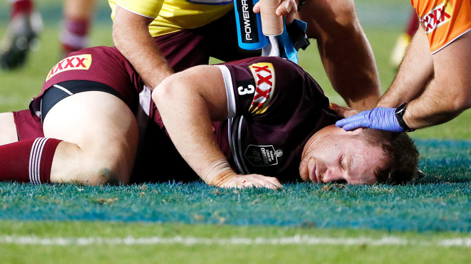 Michael Morgan was helped from the field after being knocked out in an accidental collision. Pic: Getty