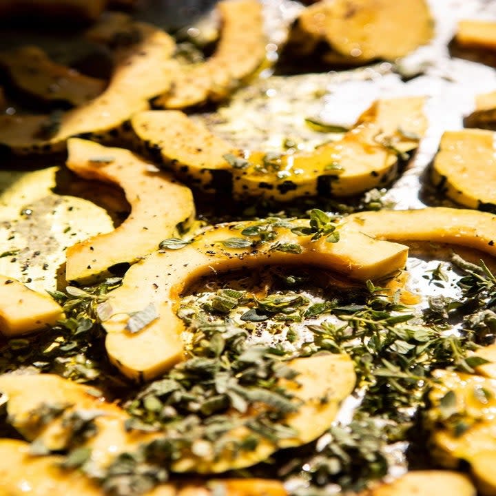 Roasting delicata squash.