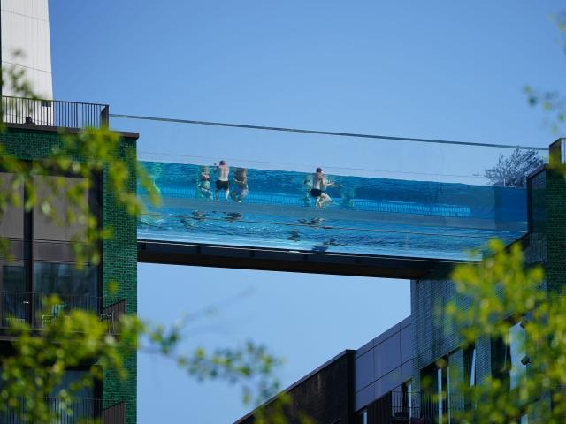 Residents can swim across 100-ft-high Sky Pool to neighboring high rise