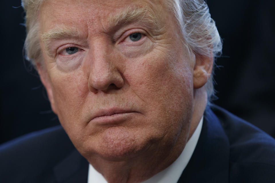 In this March 21, 2017 photo, President Donald Trump listens to a speaker in the Oval Office of the White House in Washington, Tuesday, March 21, 2017, during a signing ceremony for a bill to increase NASA's budget. Trump campaigned as an outsider, celebrating his lack of political experience by selling himself as a dealmaker willing to buck Republican orthodoxy and his own party’s leadership. He alone would reshape Washington. (AP Photo/Evan Vucci)