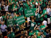Apr 22, 2016; Boston, MA, USA; Boston Celtics fans react as they take on the Atlanta Hawks during the fourth quarter in game three of the first round of the NBA Playoffs at TD Garden. Mandatory Credit: David Butler II-USA TODAY Sports