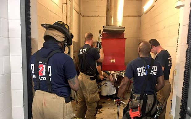 A man searching for a missing phone got trapped in a stinky situation  - Twitter / DC Fire and 