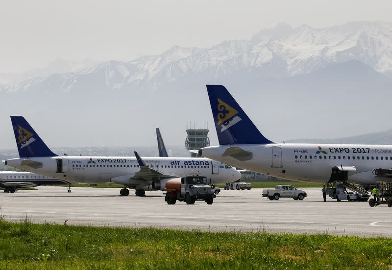 FILE PHOTO: Air Astana planes are seen on the tarmac of Almaty International Airport, Kazakhstan