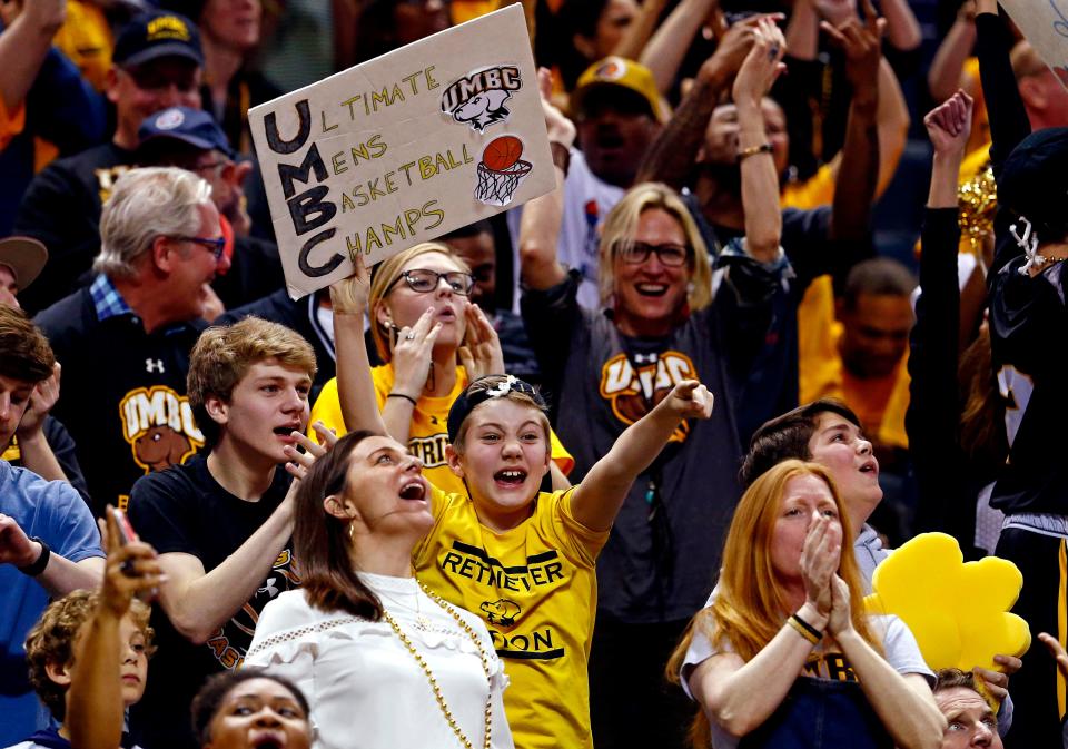 UMBC Retrievers fans cheer during a 2018 NCAA men's tournament game against Virginia. UMBC, a No. 16 seed, stunned the Cavs, the No. 1 seed.