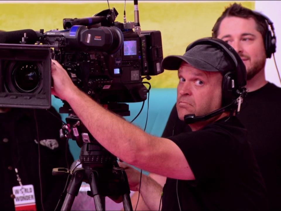 camera men behind the camera on set of 'drag race'