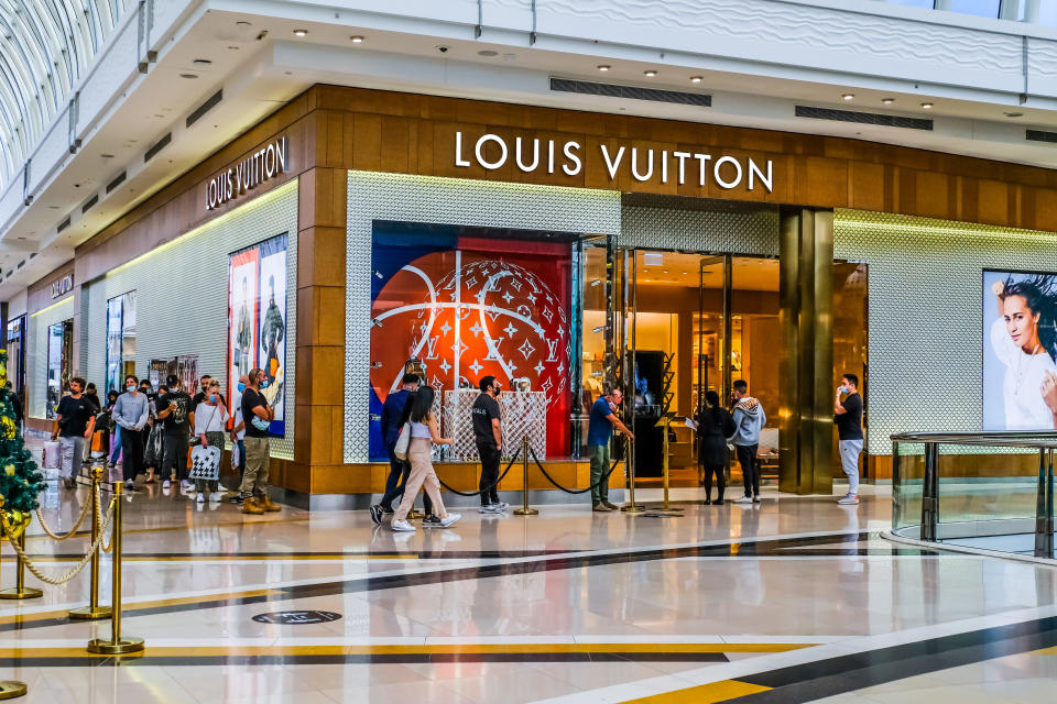 Pre Christmas shoppers lining up at Louis Vuitton store in Chadstone Shopping Centre.