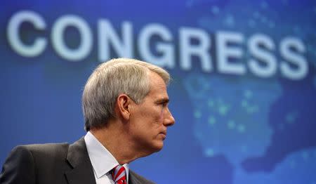 U.S. Senator Rob Portman (R-OH) takes part in a session called "The New Congress" at the Wall Street Journal's CEO Council meeting in Washington December 2, 2014. REUTERS/Kevin Lamarque
