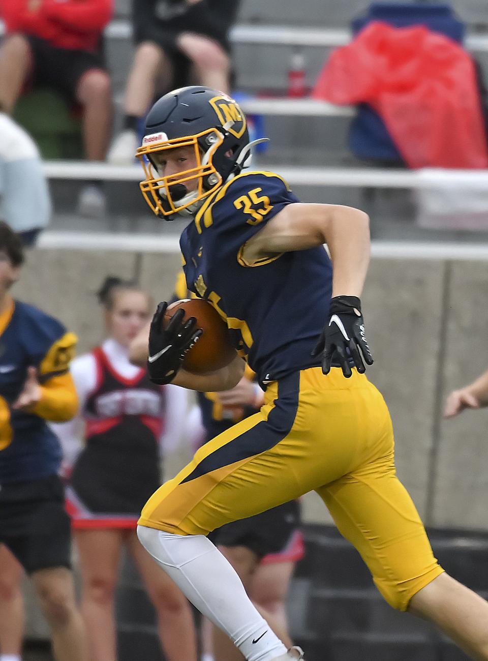 Matthew Folger of Moeller catches the ball for a long touchdown against East Central at Shea Stadium on Saturday, Sept. 3, 2022.